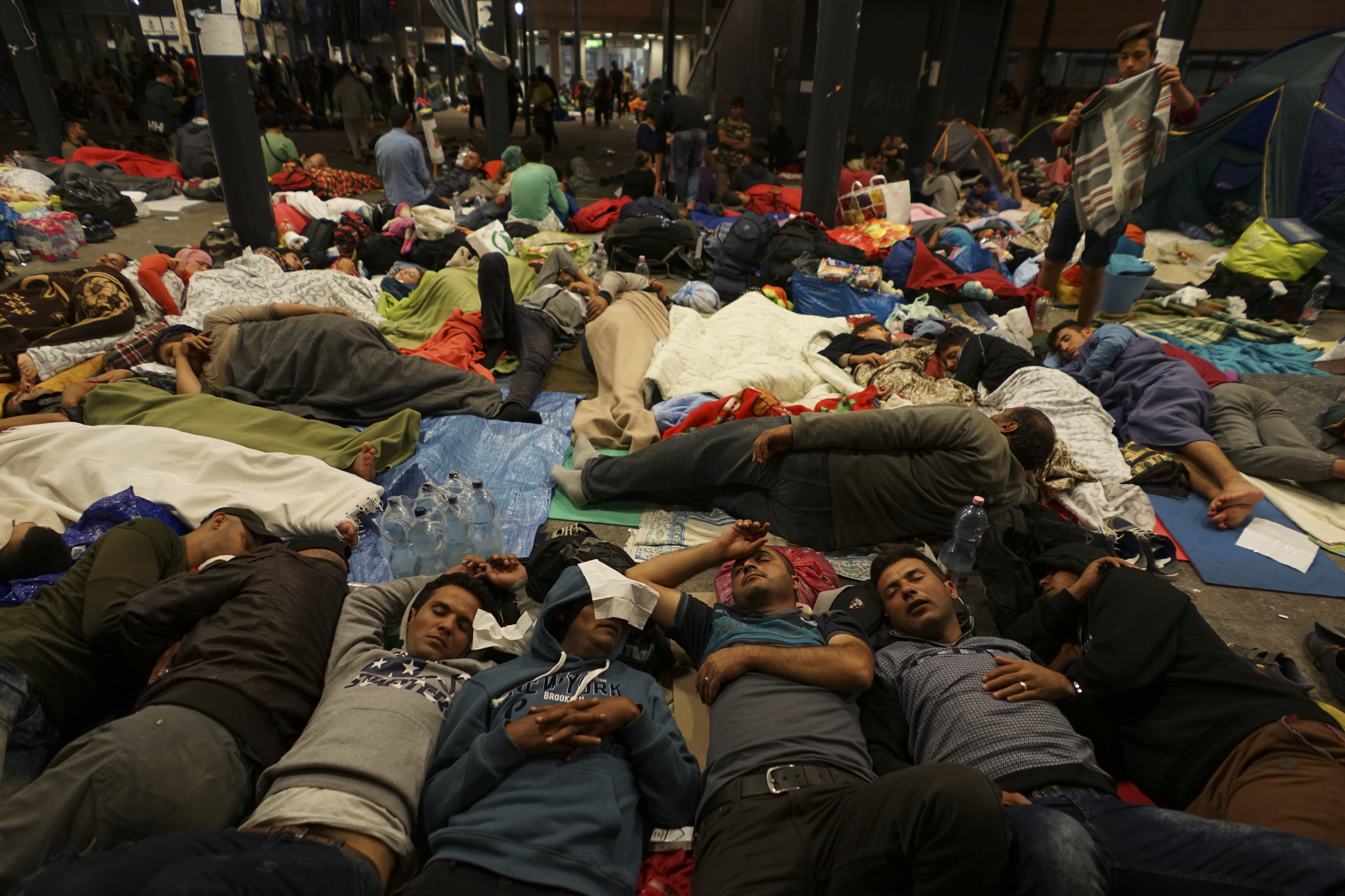 Mstyslav Chernov/Unframe - Syrian refugees having rest at the floor of Keleti railway station. Refugee crisis. Budapest, Hungary, Central Europe, 5 September 2015.